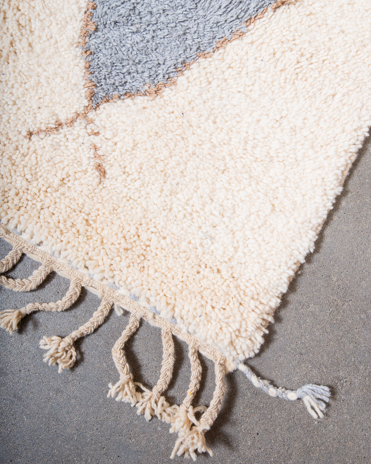 Modern, designer, handcrafted Berber rug from Morocco. Beniourain carpet with beautiful colours and patterns and fluffy wool texture.